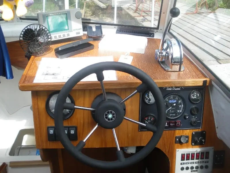 MINI-62 marine engine mounted in Seiskari 242 CC Evo boat — изображение 5
